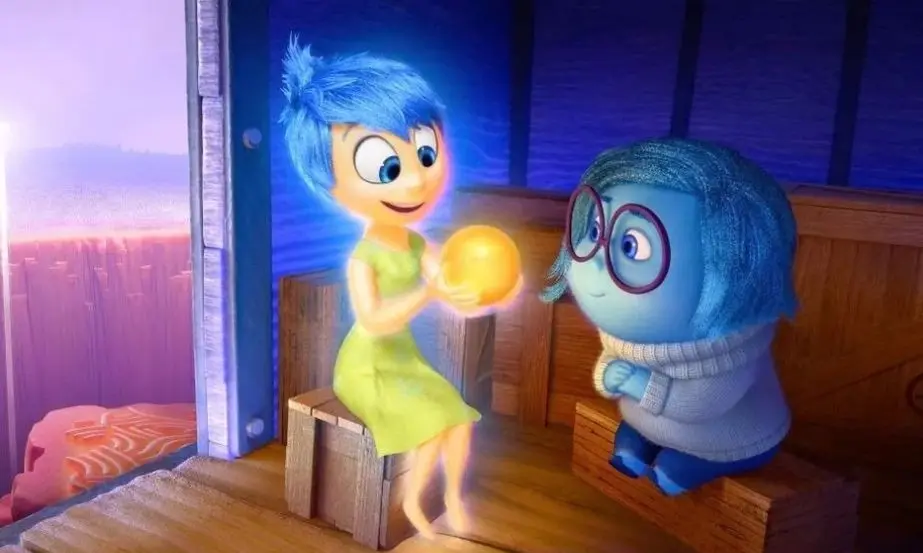 Alegría y Tristeza compartiendo un recuerdo en Del revés (Inside Out)